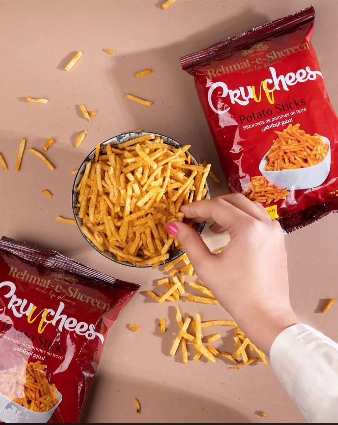 Rehmat-e-Shereen Crunchees Potato Sticks served in a bowl